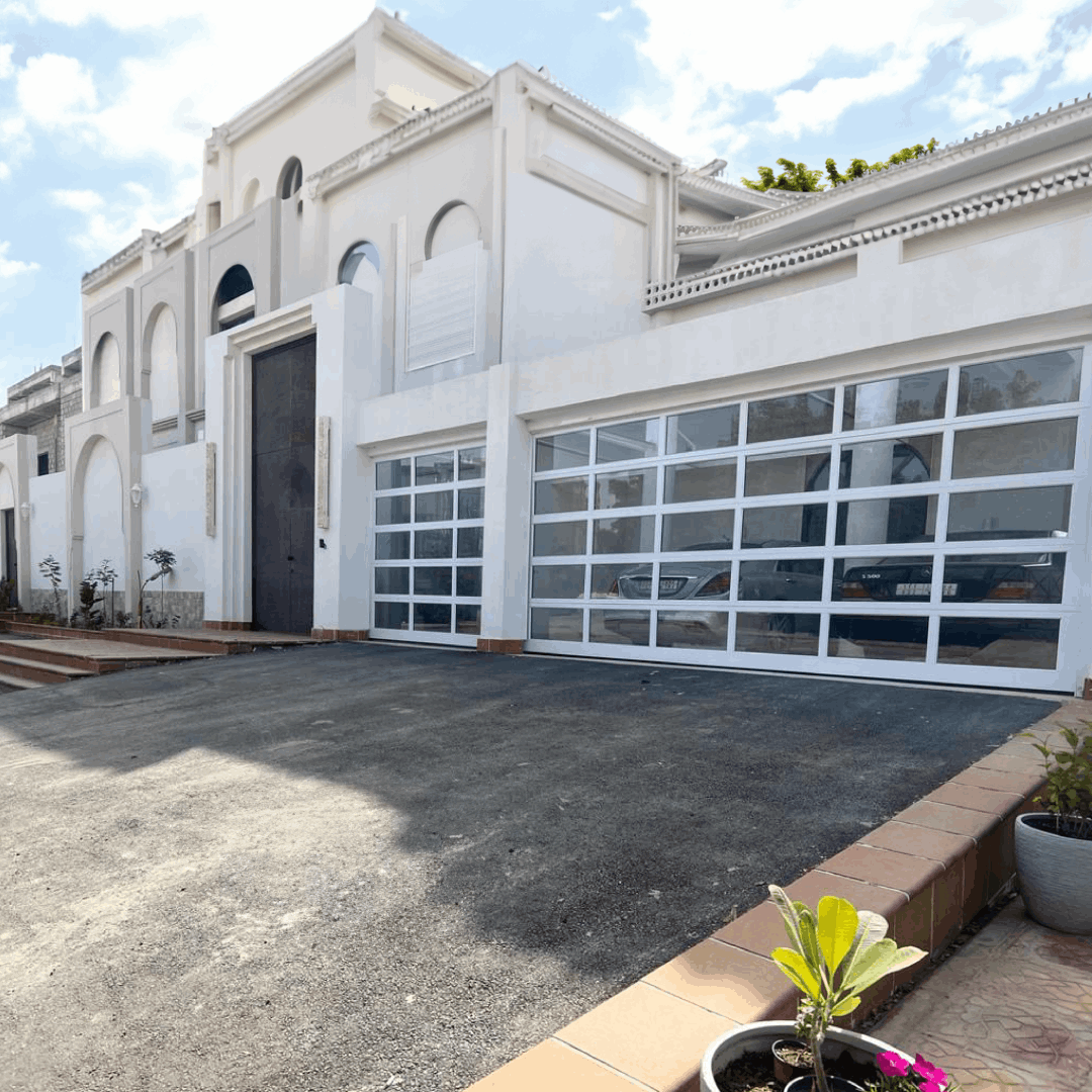 Residential roll-up garage door providing durability, and modern style